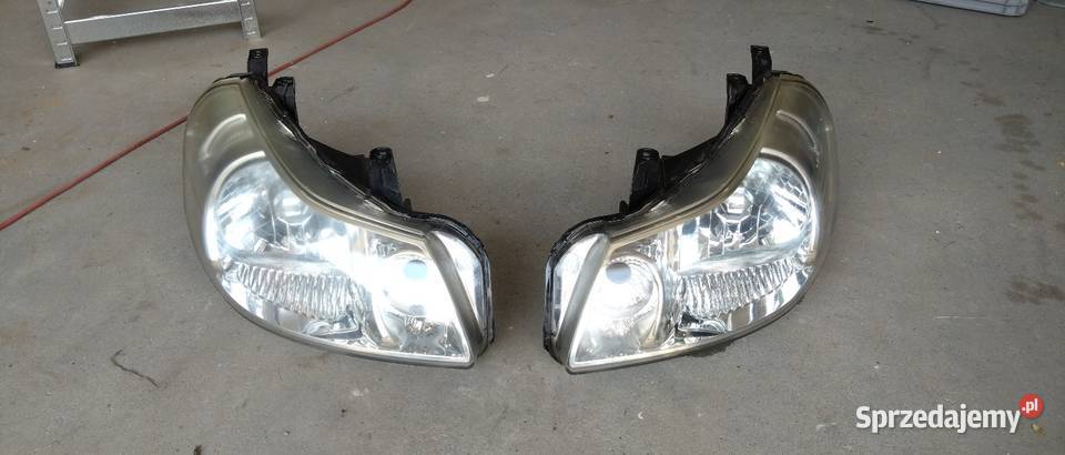 Fiat Sedici lampa przednia lewa oryginalna Węgrzce