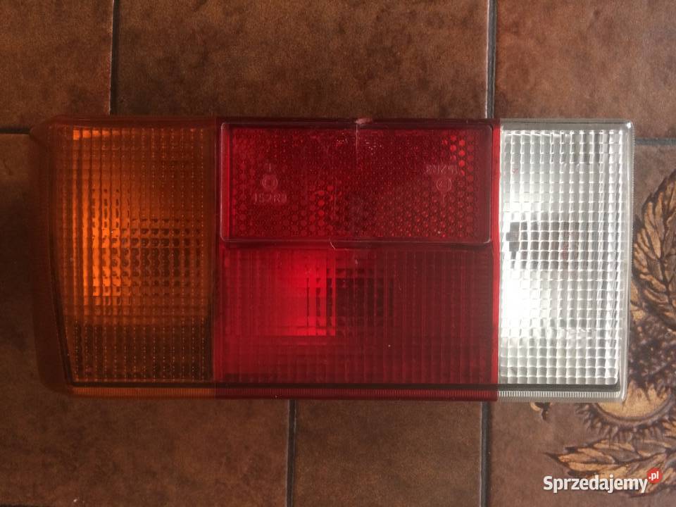 LAMPA LEWA VW GOLF I 77r 171945095 HELLA EUROPA Kutno