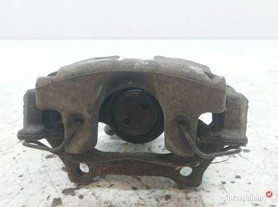 ZACISK HAMULCOWY LEWY TYŁ 20 DCI Renault Laguna Zaciski i jarzma