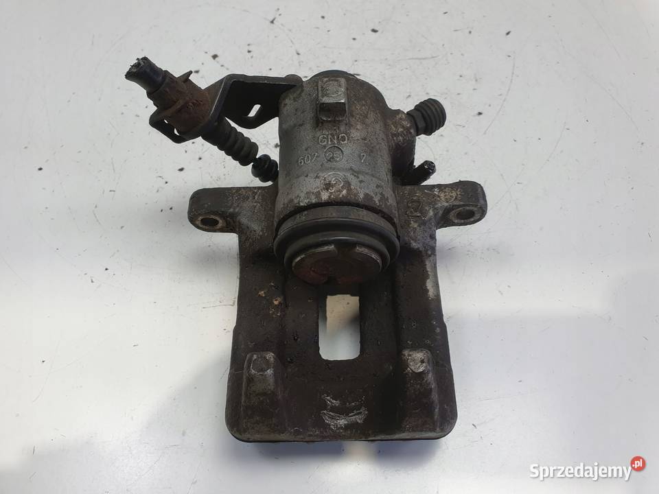 VW Golf IV Bora Audi A3 Toledo II LEWY ZACISK Chełm