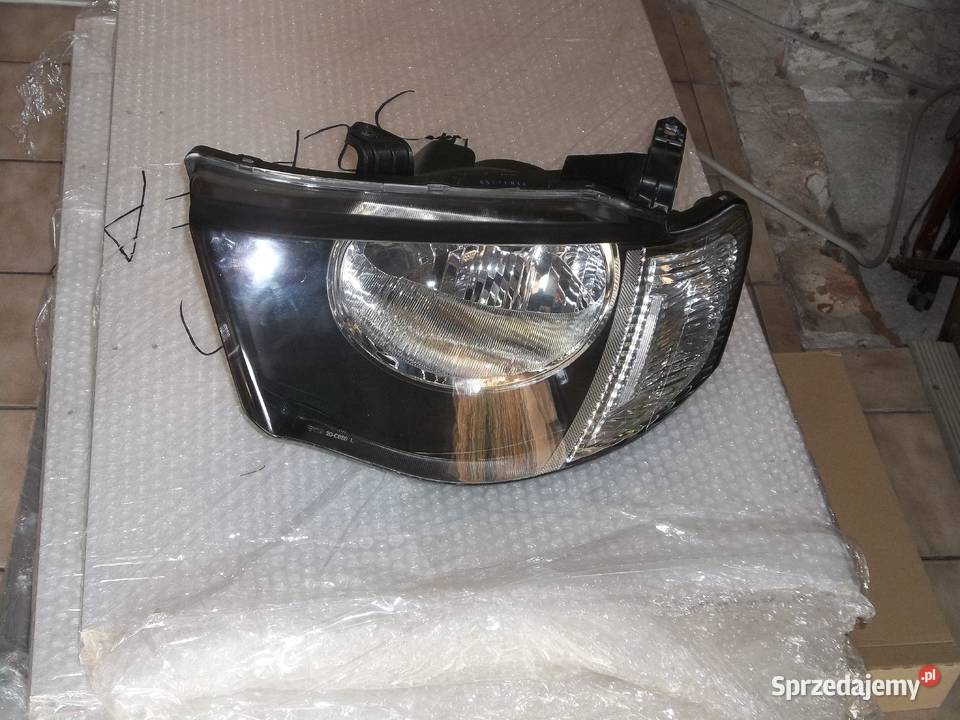 mitsubishi l200 l 200 reflektor lampa nowa lewa Jędrzejów