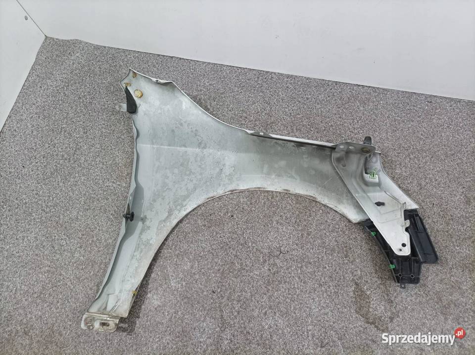 BŁOTNIK LEWY PRZÓD 614 Volvo V60 I 2010