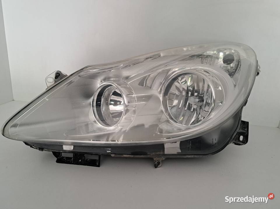 OPEL CORSA D 0614 LAMPA PRZÓD PRZEDNIA LEWA Lampy przednie