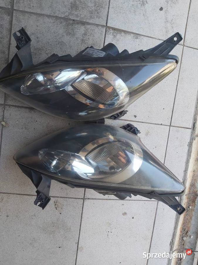 Toyota Aygo 2009 reflektor lampa wersja Radziszów