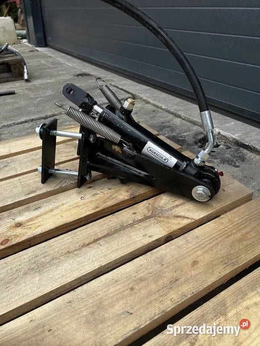 Hamulec hydrauliczny z zaworem do przyczepy Łętowe