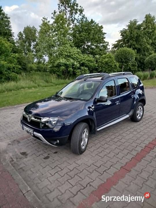 Dacia Duster 16 benzyna 2013r 216000 100 sprawny granatowy wielkopolskie Kleczew