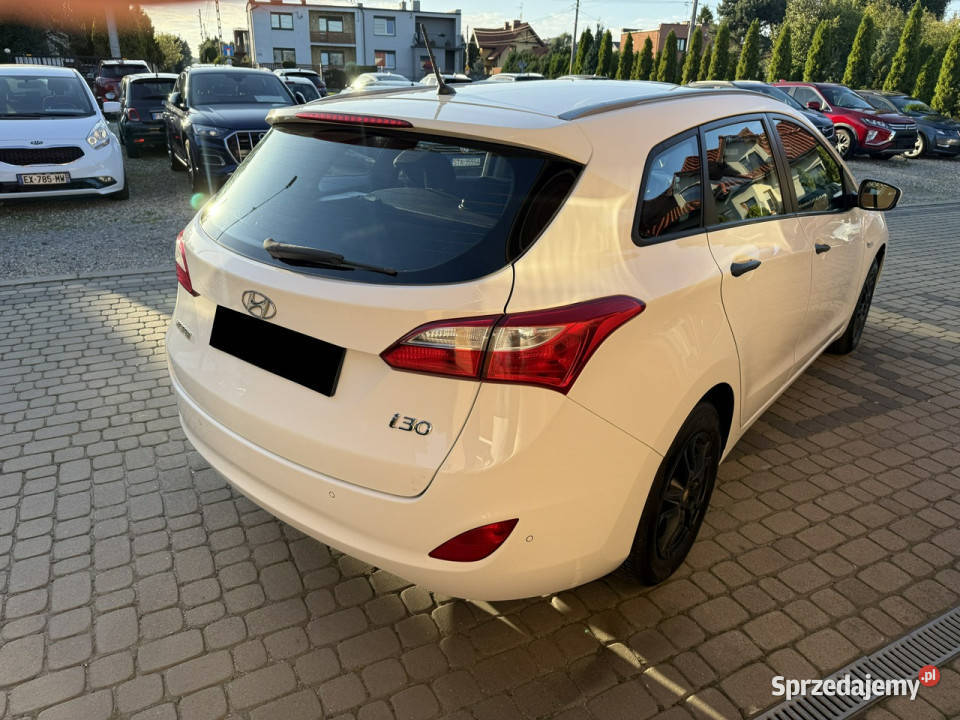 Hyundai i30 Rej012013 14 100 Klimatyzacja II światła do jazdy dziennej Orzech