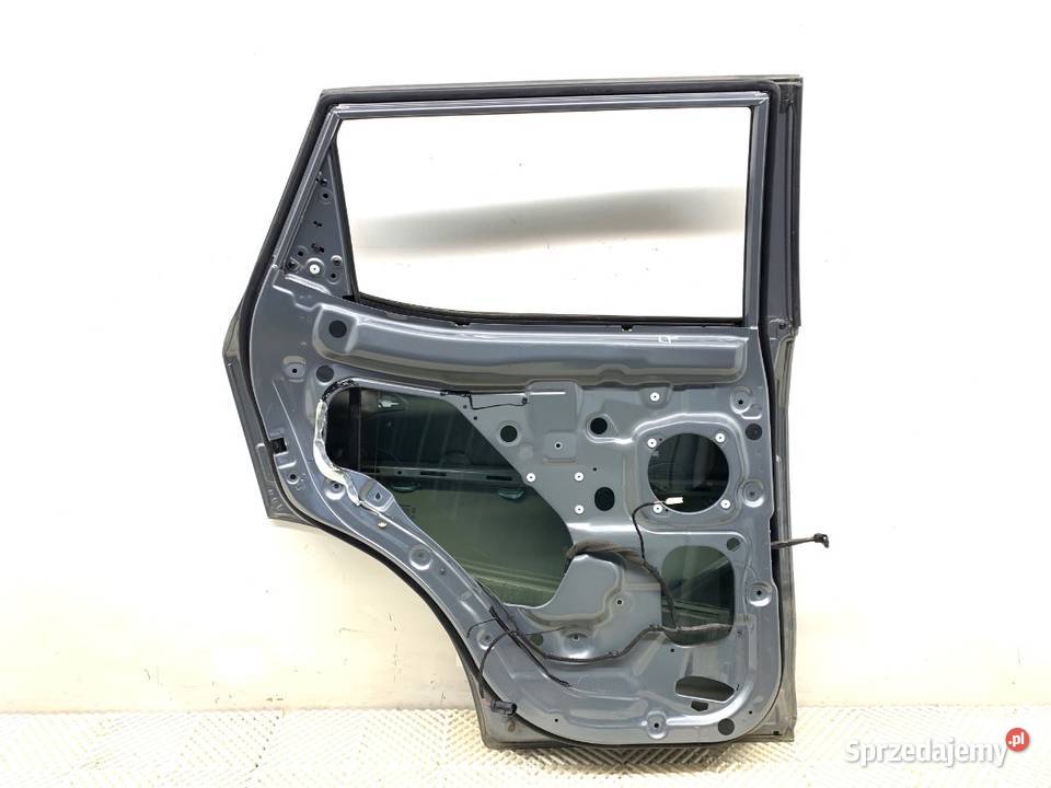 DRZWI LEWY TYŁ SSANGYONG TIVOLI Crossover SZARY Drzwi