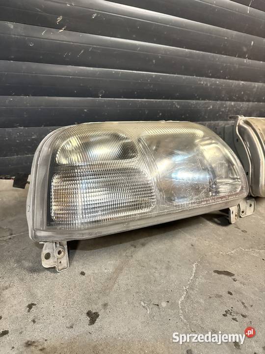 10032080 Reflektory suzuki grand vitara KOITO Lampy przednie śląskie Łazy