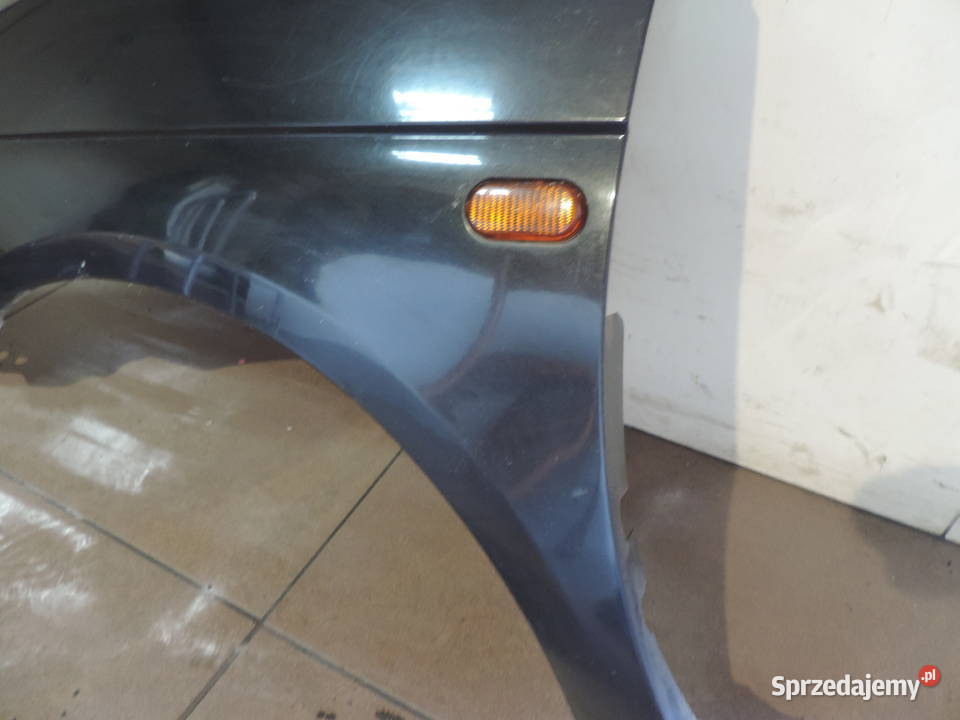 BŁOTNIK LEWY PRZEDNI RENAULT SCENIC 1 FL Rok produkcji 2002 Nowy Sącz