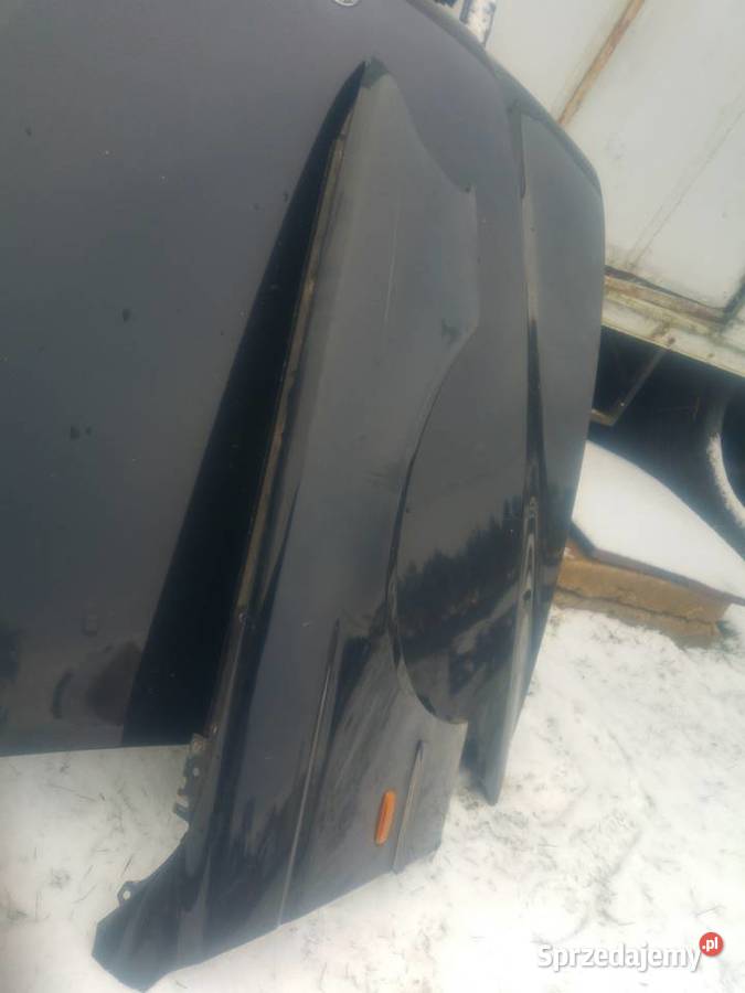 BMW E39 błotnik prawy czarny