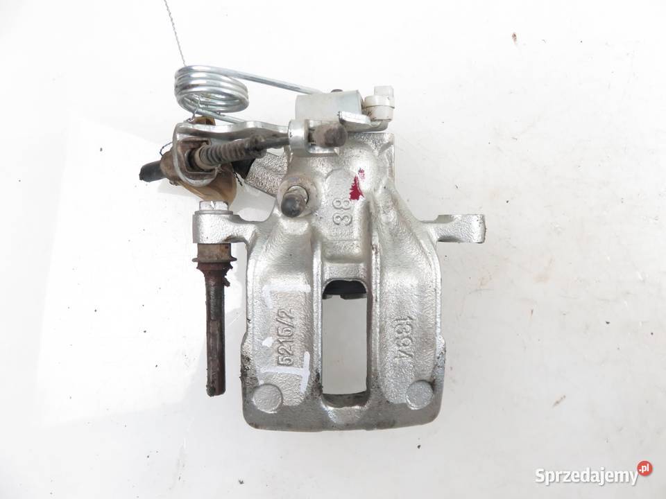 ZACISK LEWY TYŁ AUDI A4 8D2 B5 JBC0237