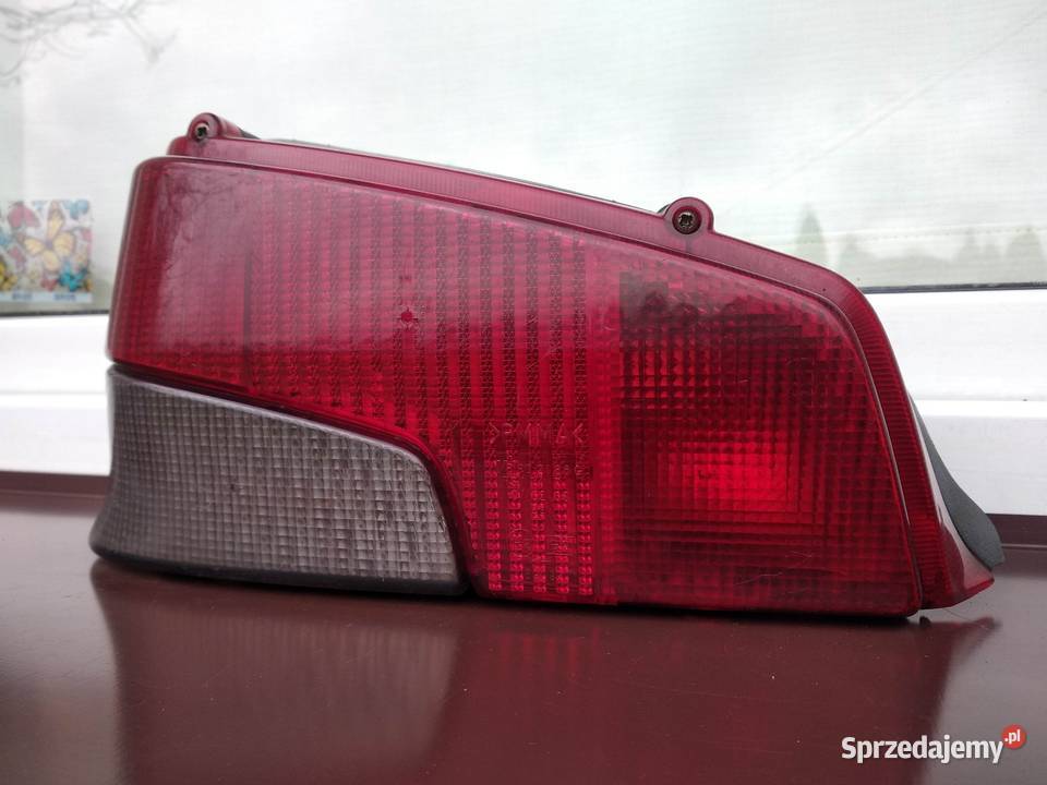 Peugeot 106 lampa tył tylna lewa wkład oprawka Sieradz