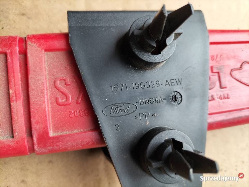 TRÓJKĄT OSTRZEGAWCZY 27R030302 UCHWYT FORD Kamień-Kolonia