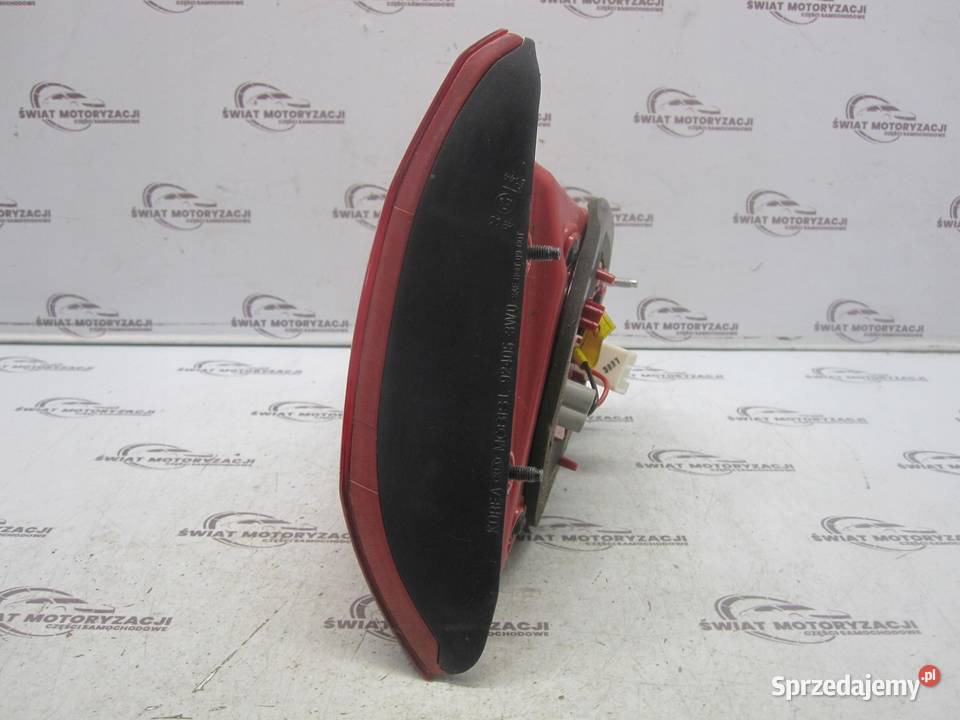 KIA SPORTAGE III 12r lampa lewa tył w klapę