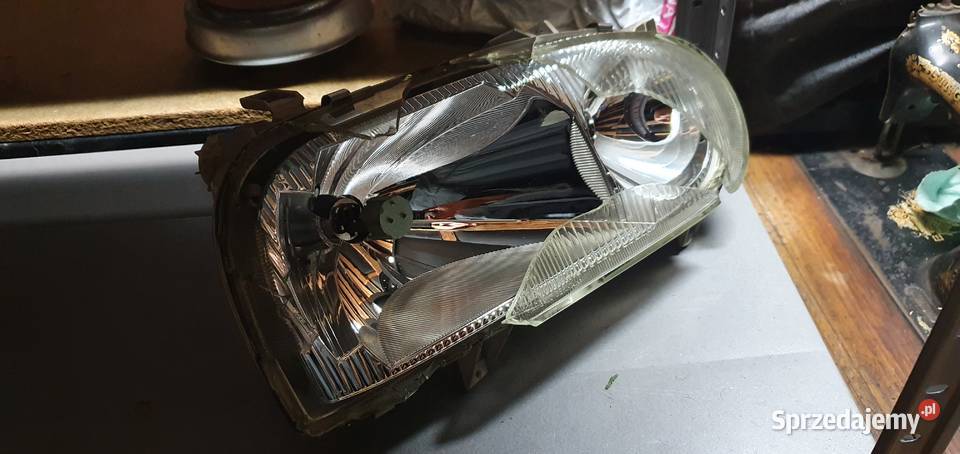 Reflektor prawy Golf 3 III Hella 13917400R