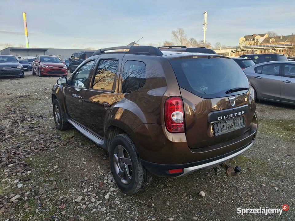 dacia duster 16 benzyna 4x4 163000 brązowy Duster Łódź
