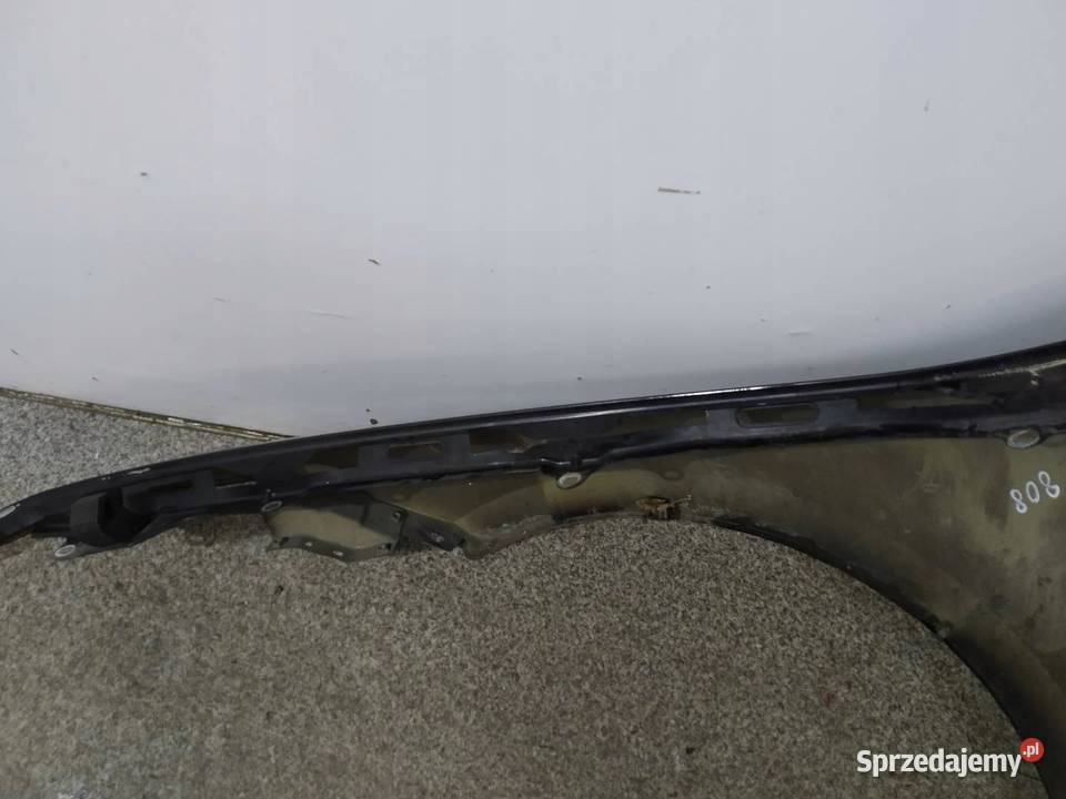 BŁOTNIK PRAWY PRZÓD CZARNY PRZED LIFT USZKODZONY Rok produkcji 2009 Motoryzacja