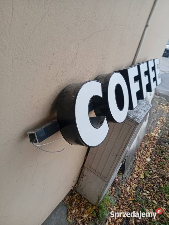 Szyld reklamowy coffee plus obraz Świecie