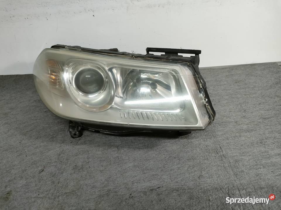 Megane II lift prawa lampa przód EUROPA Swarzędz