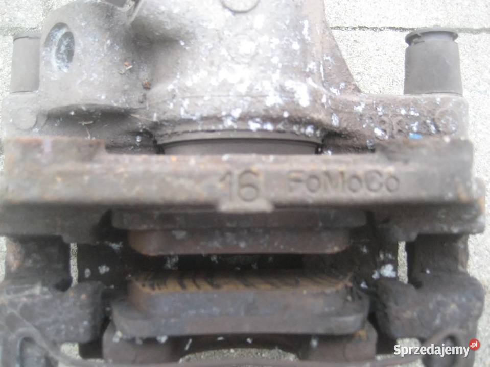 volvo v50 s40 0412r zacisk hamulcowy jarzmo tył Części samochodowe Rakoniewice