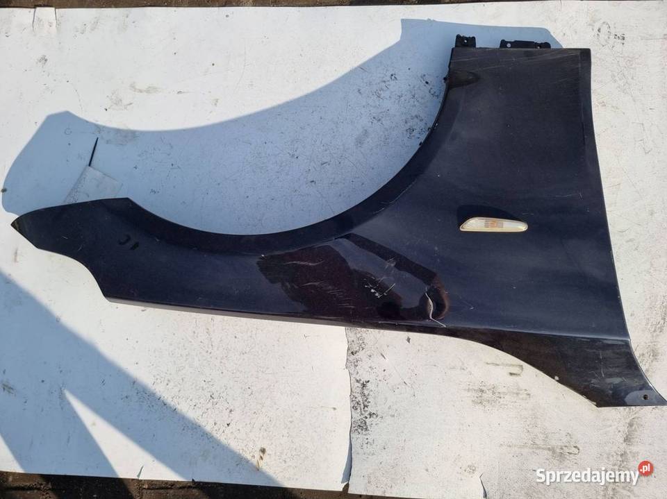 BŁOTNIK PRAWY PRZÓD BMW E61 ORIENTBLAU METALLIC Lipno