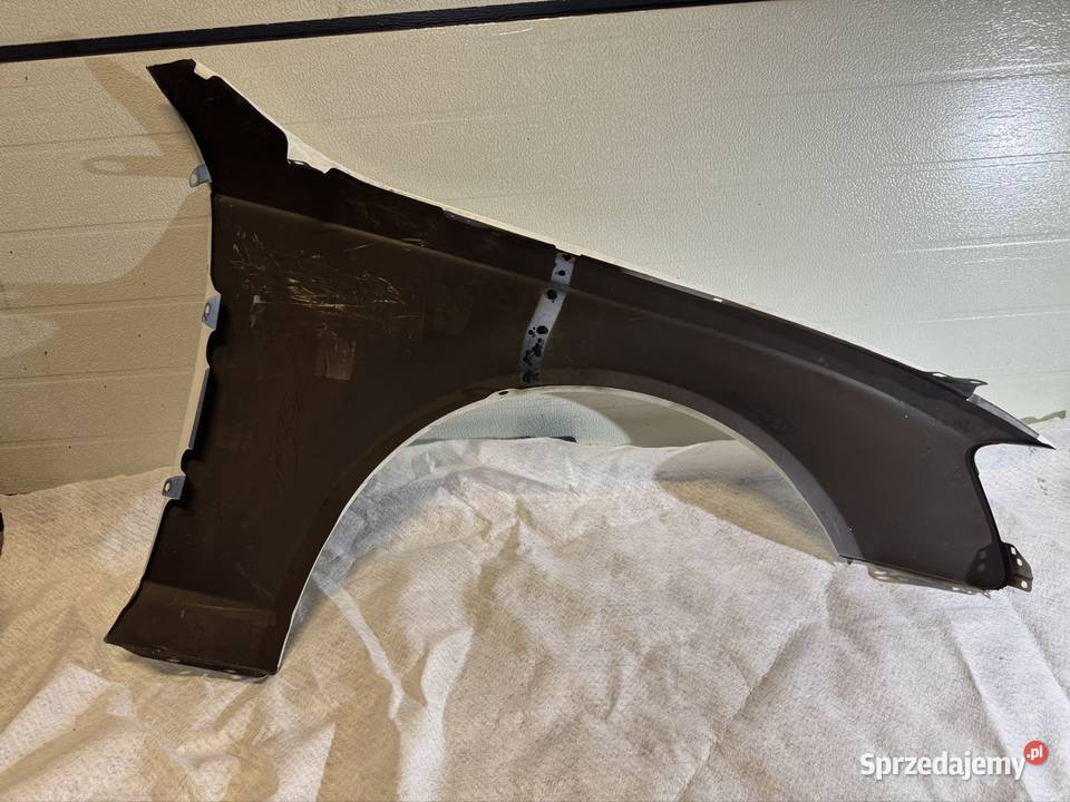 Błotnik lewy Audi A4 B8 0711 Błotniki Jasienica