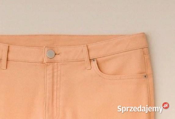 Bawełniane dżinsy morelowe z przetarciem Bonprix Długie sprzedam