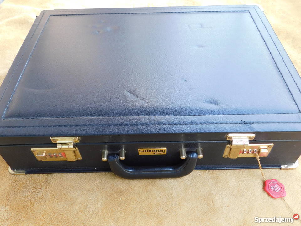 Sztućce Solingen 12os 72 el stal 1810 walizka Katowice