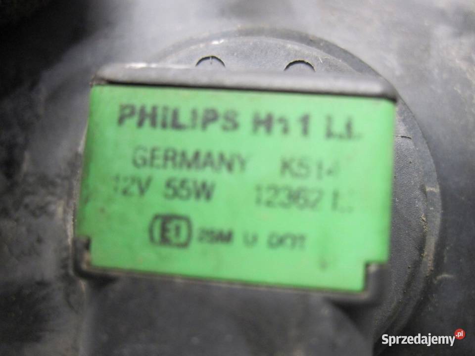 BMW E91 06r halogen prawy przód 6948374