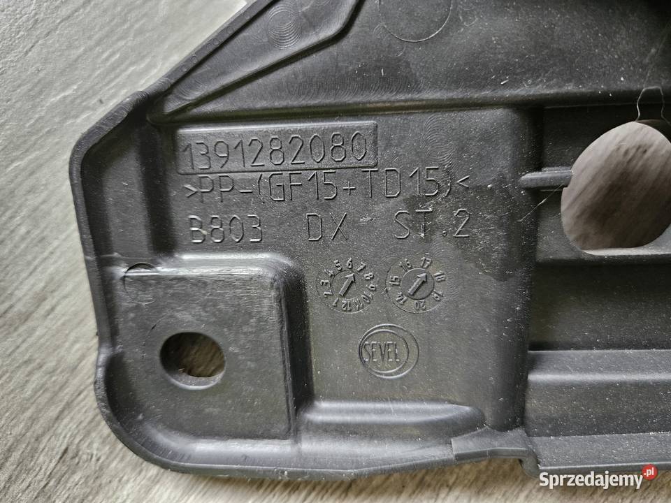 Wspornik ślizg zderzaka lampy prawej przód Fiat Turek