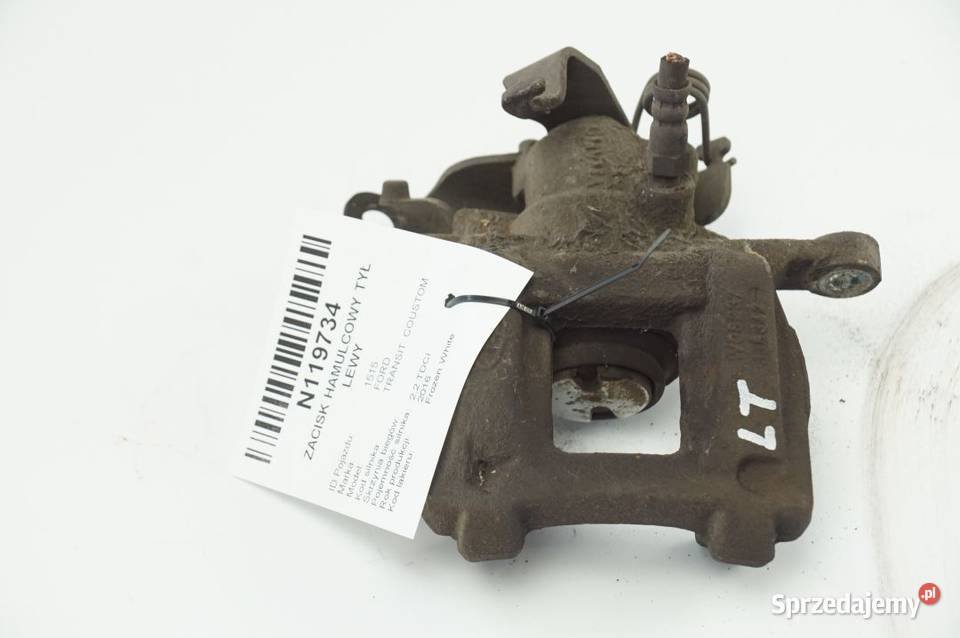 W08237 TRANSIT COUSTOM ZACISK HAMULCOWY TYŁ LEWY osobowe Pozostałe kujawsko-pomorskie Lipno