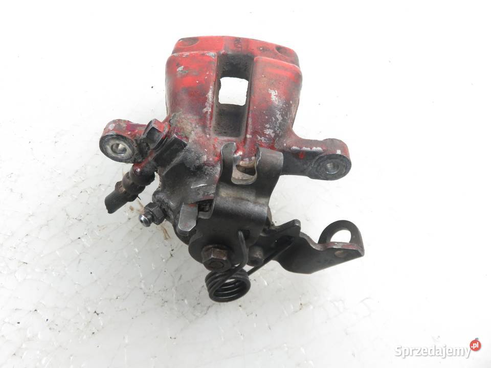 ZACISK PRAWY TYŁ OPEL ASTRA III H