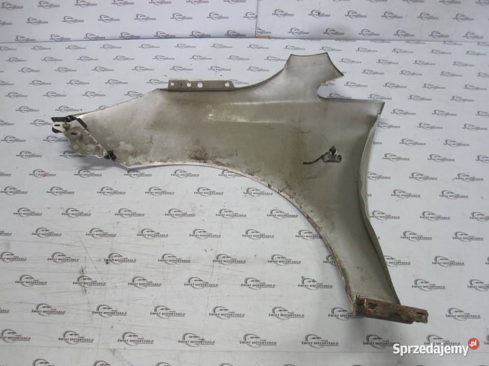 OPEL CORSA E 17r błotnik prawy przód