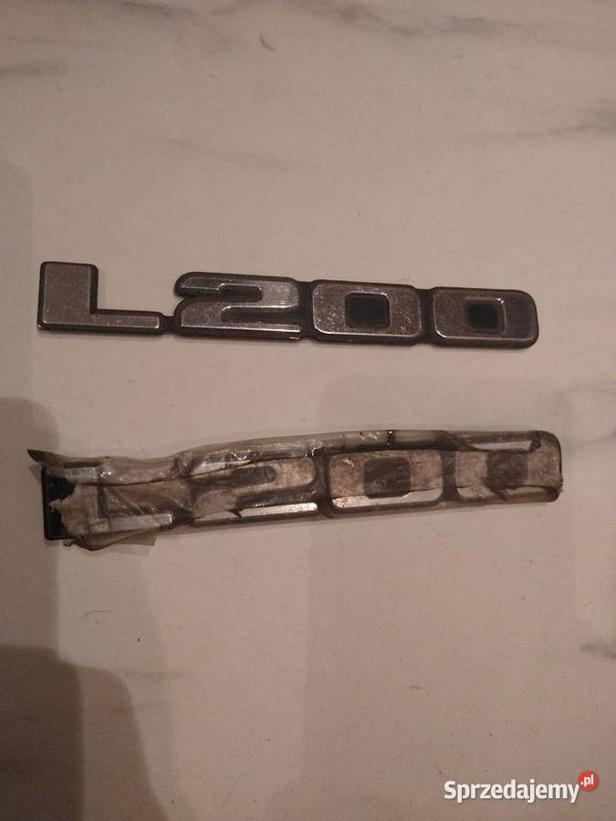 Emblemat Mitsubishi L200 2 sztuki Rok produkcji 1995 kujawsko-pomorskie