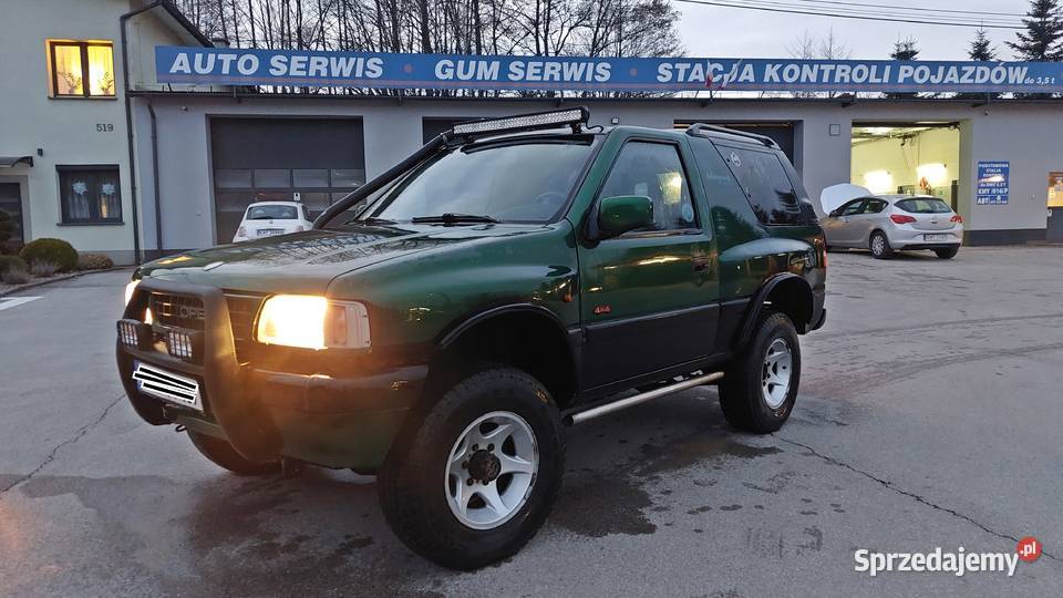 Opel FronteraDB STAN HALOGENY RELINGI HAK Wiśniowa