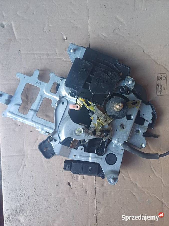 Kia Carnival lll zamek drzwi lewy tylni Nowy Tomyśl sprzedam