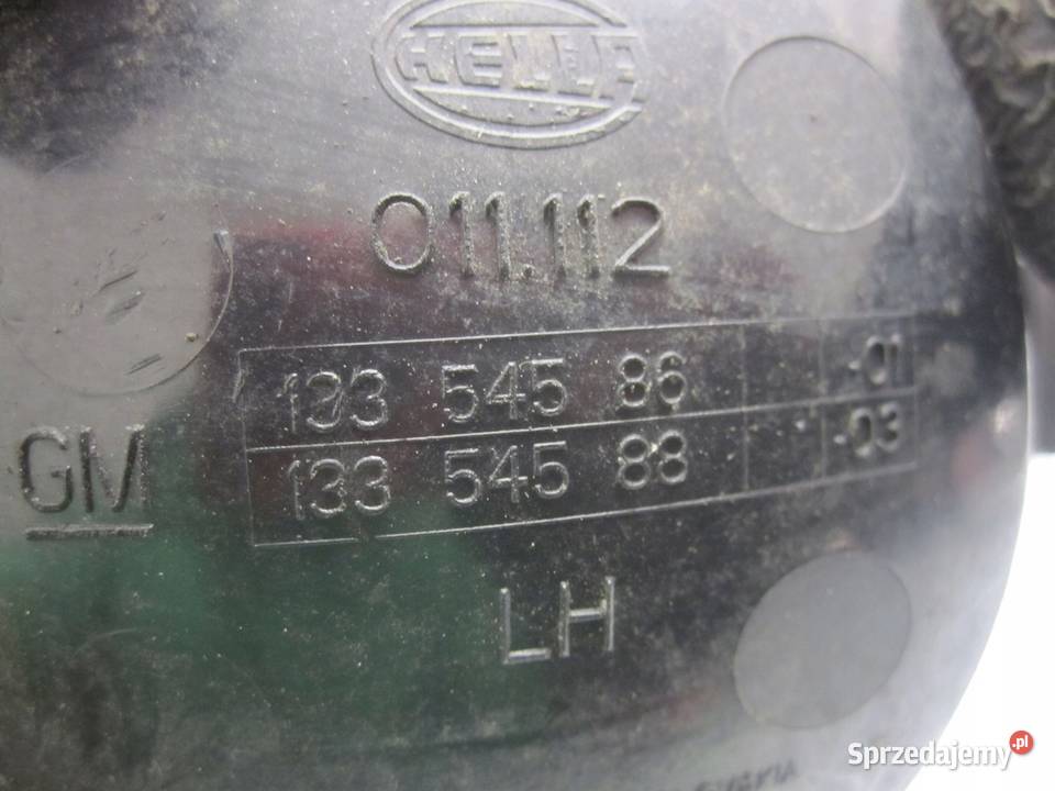 OPEL ADAM 13r lampa cofania lewa tył 13354586 Lampy przeciwmgielne Kielce