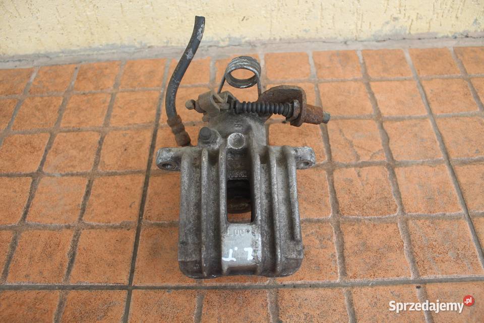 ZACISK HAMULCOWY LEWY TYŁ AUDI A4 B6 25 TDI