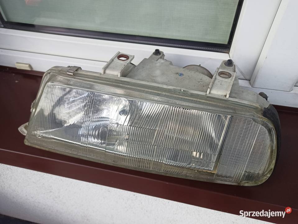 Lancia Kappa lampa przednia lewa reflektor przód Sieradz