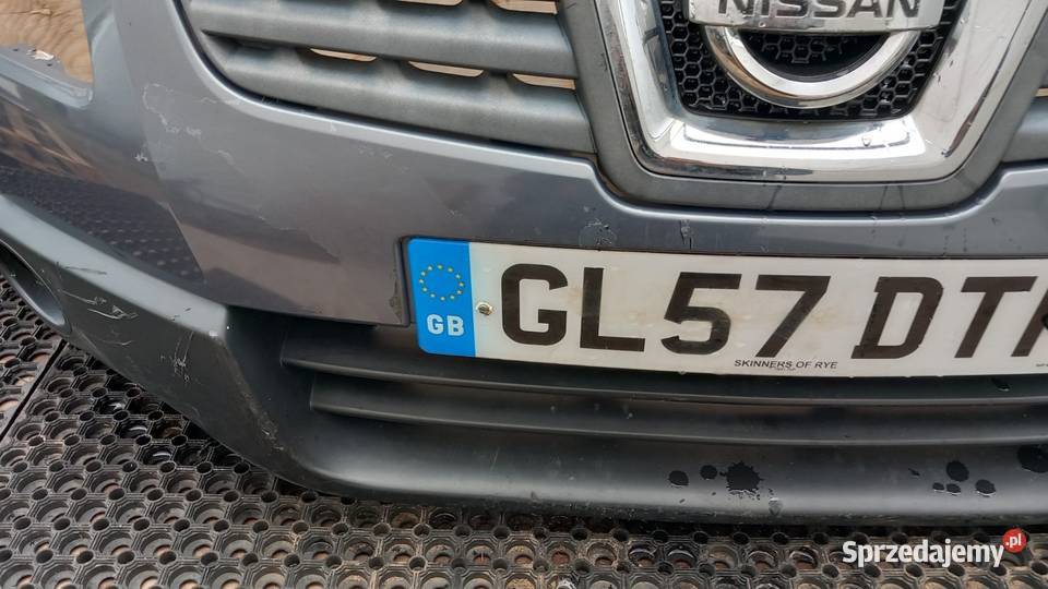 NISSAN QASHQAI J10 ZDERZAK PRZÓD HALOGEN B526 Zbierkowo