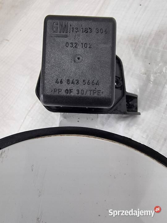 Klapka wlewu paliwa Z474 Opel Corsa D 13183306 osobowe
