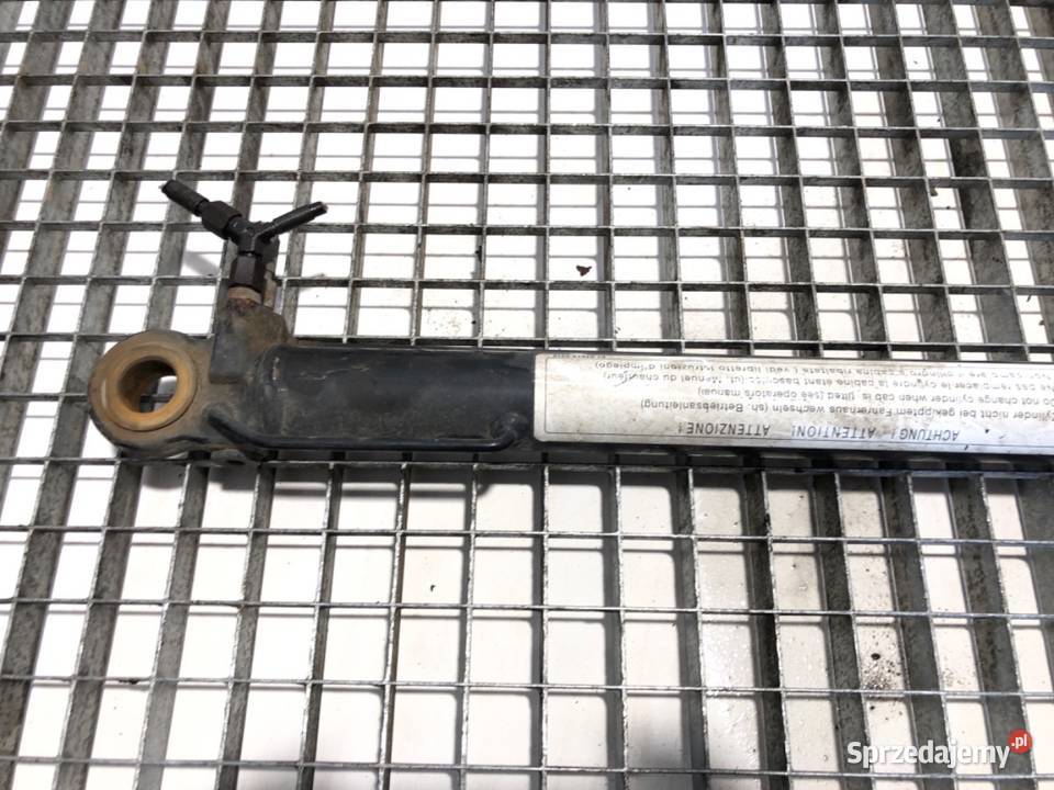 SIŁOWNIK PODNOSZENIA KABINY 1023357