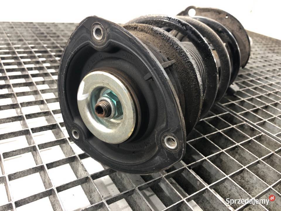 AMORTYZATOR LEWY PRZÓD ZE SPRĘŻYNĄ VW PASSAT B8 osobowe podkarpackie