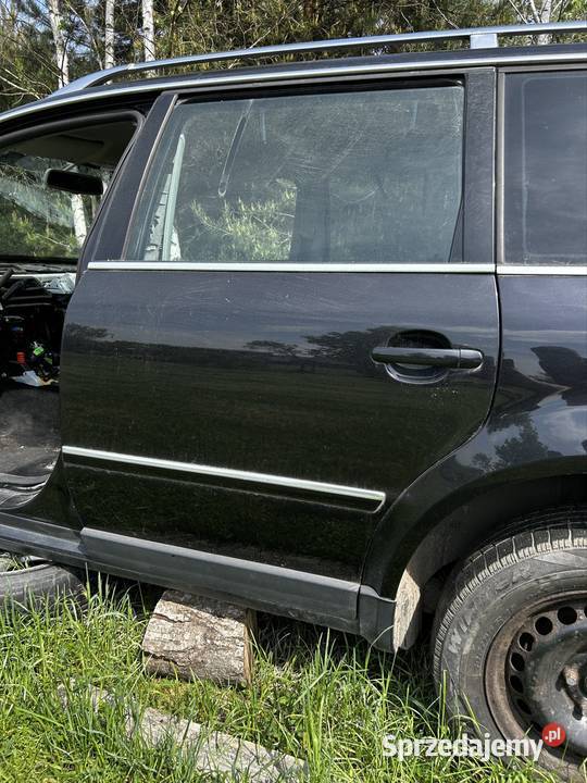 Lewe drzwi tył Passat B5 FL