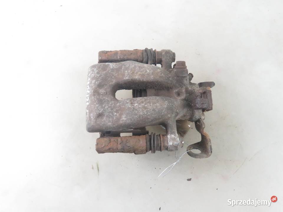 ZACISK LEWY TYŁ OPEL ASTRA III H 13 CDTI sprzedam