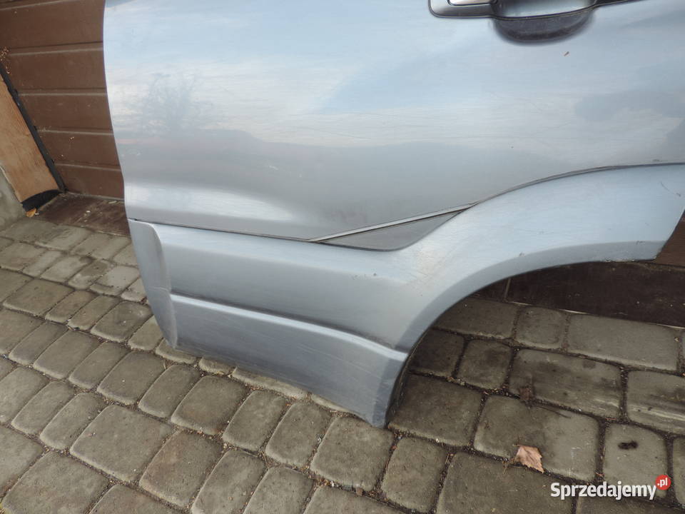 SUZUKI GRAND VITARA 1 5D DRZWI LEWY TYŁ ZY4C13 małopolskie Nowy Sącz