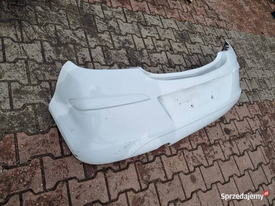 ZDERZAK TYLNY TYŁ OPEL CORSA D ZDERZAK TYLNY TYŁ osobowe Motoryzacja