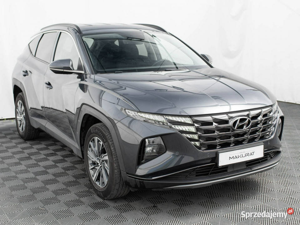 Hyundai Tucson WJ8596M16 TGDi HEV Executive 2WD immobilizer Pępowo