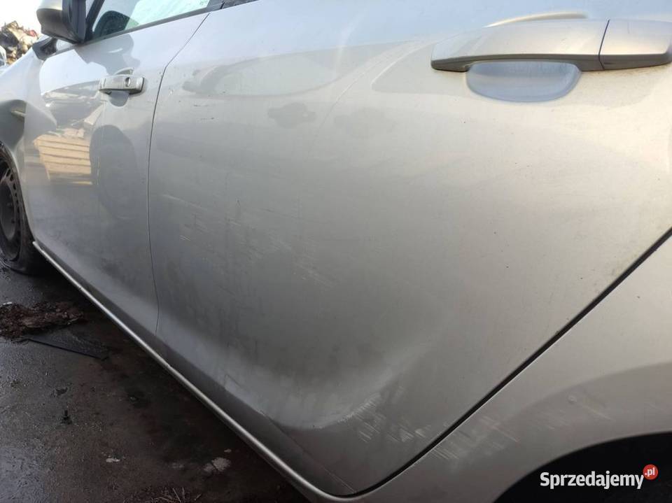 DRZWI LEWE TYŁ OPEL ASTRA J Z176 Pozostałe Lipno